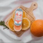 ⁦مرطب توبينج بالم بلس للترطيب والتوريد من ليتل بيبي - نكهة البرتقال⁩ - الصورة ⁦2⁩