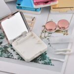 حافظه عدسات مع ملقط وعبوه محلول للسفر